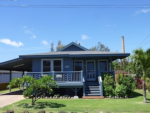 Beautiful yard with fenced rear and covered carport