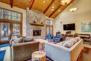 Couches around a gas fireplace provide the perfect place to cozy up