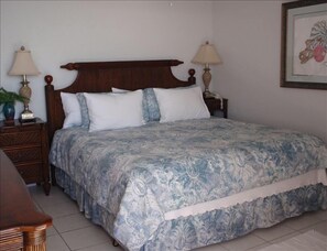 The Master Bedroom opens onto the balcony.  Trade winds and the Sea...divine!