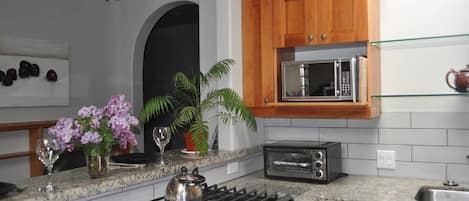 Kitchen with gas range.
