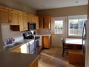 Downstairs kitchen with all new appliances