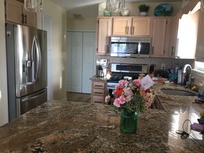 Kitchen with stainless appliances and granite counter top