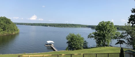 View of lake and dock from upper balcony.  Great place to have morning coffee! 