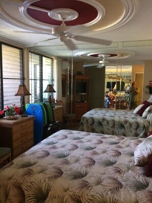 Bogie boards are stowed  between the dresser and the mirrored wall.