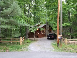 The flat driveway will accommodate several vehicles, just 3 miles off main road