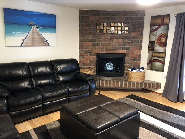 Living Room with motorized reclining sofa