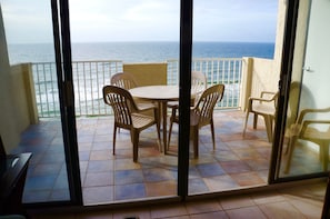 Tiled balcony with east, south, and west views of gulf