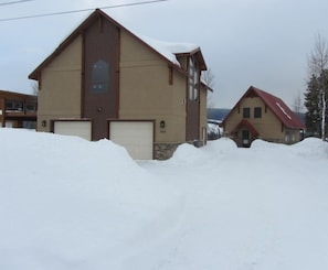 2014View from Cranmer Ave, Feb snow, Garage foreground, Cabin background.