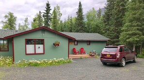 Lake house with entry deck and parking are