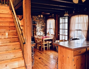 Looking from entry door. The glass door  goes out to screened porch. 