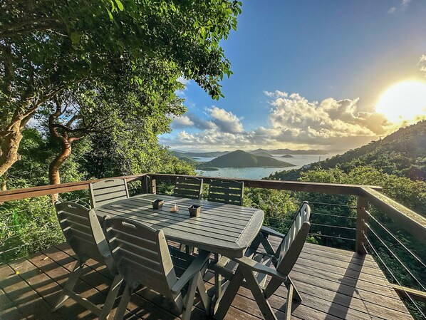 Enjoy panoramic views from your private deck overlooking Coral Bay!