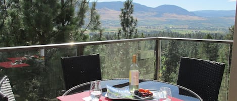 Relax & Enjoy serene views from newly  furnished top floor patio with new bbq