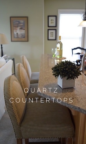 Beautiful quartz, modern kitchen. Extended Eating for 3 at the bar/counter