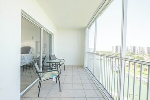 Large balcony with plenty of seating.