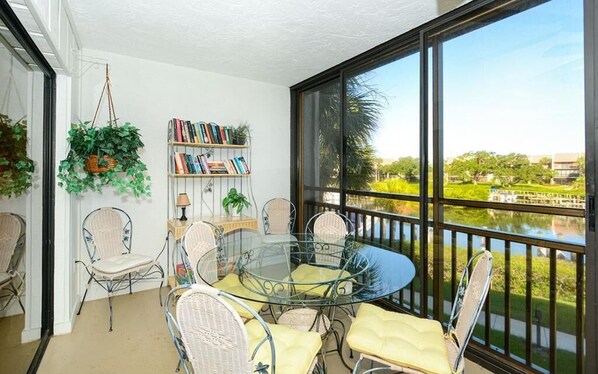 Enjoy the view of the canal from your cozy lanai