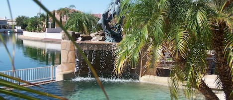 Infinity Edge Pool with Cave Under Waterfall