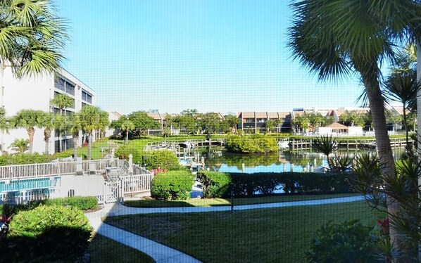 Lush tropical landscaping along the water canal
