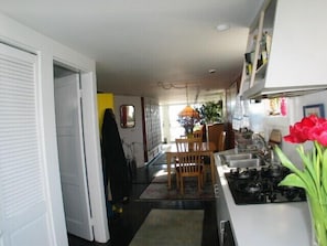 from entry and kitchen towards  dining/living area