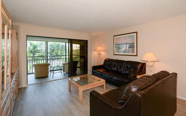 Natural light pours into the living room