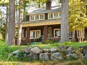 The front porch with stone fireplace
