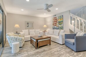 The living room has plenty of seating for everyone