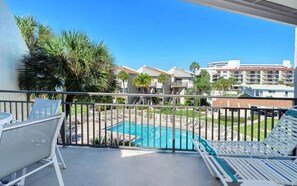 Private loungers overlooking the pool