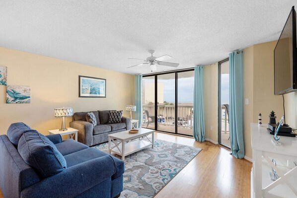 Living area with ocean view and porch