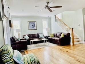OPEN LIVING AREA. LARGE COMFY LEATHER SOFAS.