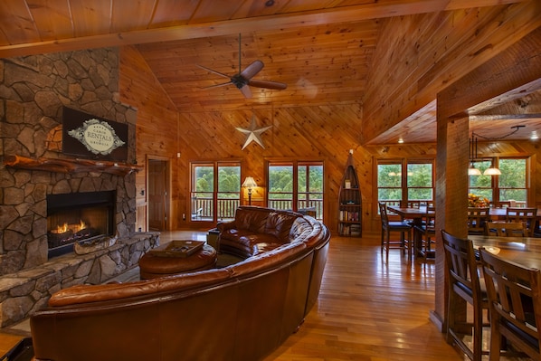 Elegant Great Room featuring All-Wood Interior and Beautiful Window-Wall Views