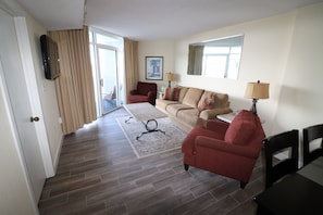 Living room and oceanfront balcony from the second floor