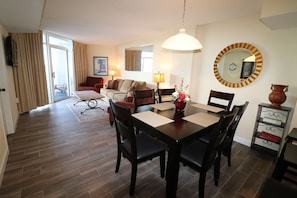 Living room and Dining area with oceanfront balcony