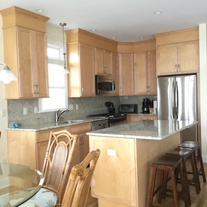 Jackie has all the kitchen utensils etc you will need in those cabinets.