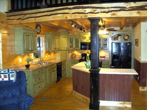 You'll Fall in LOVE with the Green Distressed Kitchen Cabinets & Red Knobs