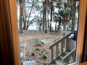 View from the dining room of the backyard and deck. Yes, we can see the dophins!