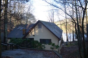 Front of house with lake in background 
