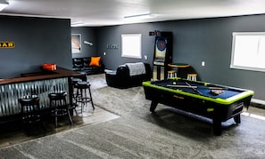 The rec room! You won't want to leave once you get here! Pool, darts, bar, TV...