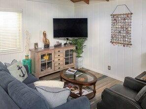Cozy couch and recliner w/Samsung 55" TV loaded with DIRECTV Ultimate package