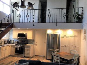 Open floor plan! Downstairs: living, kitchen & dining. Up: 2 bedrooms & bathroom