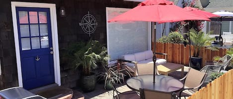 Shared front patio. The Dock is the back unit of this classic duplex.