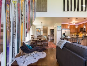 great room featuring snow ski banisters