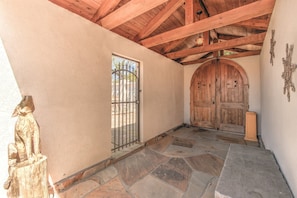 Courtyard entrance to gated villa.  Private patio to the front and to the side.