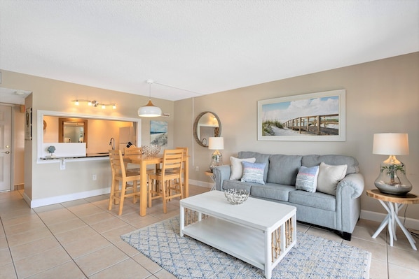 Open-concept living and dining area—cozy, bright, and inviting!