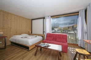 Living room with a double bed