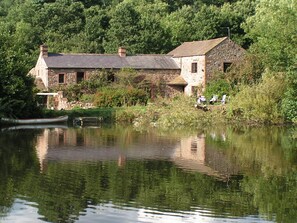 The house has its own lake for swimming and boating. 
