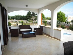 Living furniture on the first floor patio