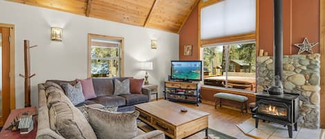 Tv room with wood fireplace: Tahoe Donner Creek Side Retreat with Hot Tub