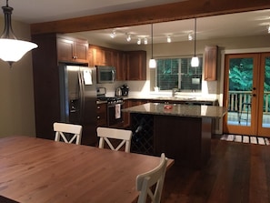 Beautiful new kitchen; dining table extends to fit eight guests comfortably