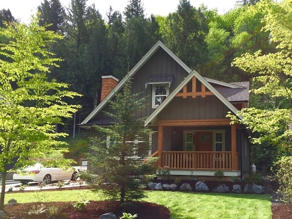 Front porch with fir timber posts; driveway easily accommodates two cars