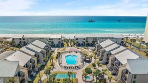 Courtyard with shuffle board, pool, and hot tub - our unit right on the beach!