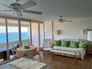 Common area with futon couch and dinning table